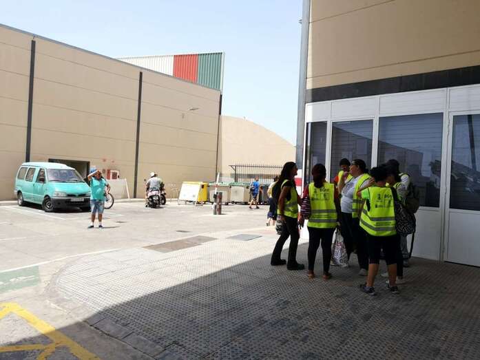 Trabajadores en Vecindario (Foto TA)